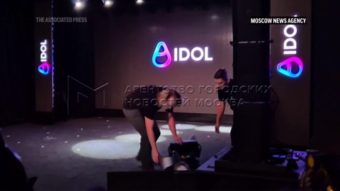 Russian humanoid robot collapses face first during stage showcase