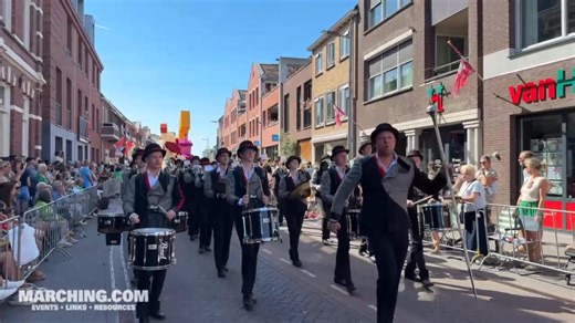 The Sint Joris Showband (Hoogeloon, Netherlands) delivered non-stop showmanship at Corso Zundert, bringing all the right music, moves and charisma to the route. A great performance through the charming streets of Zundert. #corsozundert #netherlands #flowerparade St. Joris Showband | Marching.com