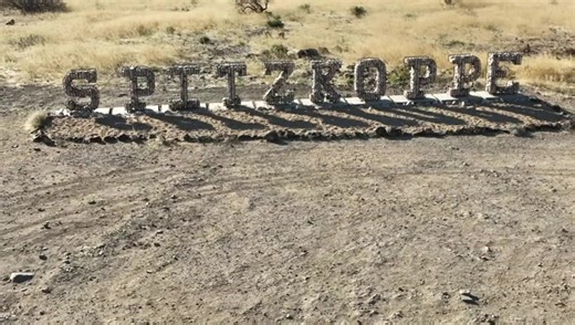 The Spitzkoppe mountain range's granite is dated at more than 700 million years old. The mountain's distinctive shape has earned it the nickname the Matterhorn of Namibia. Made up of a number of large distinctive peaks that jut up in different areas on the landscape, the main peak is known as Gross Spitzkoppe.