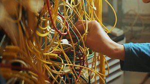 Networking service. network engineer administrator checking server hardware equipment of data center 7