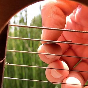 Slow mo thalia pick in action with our new Thalia Guitar Cam... | THALIA CAPOS