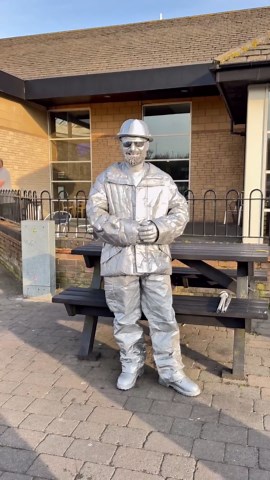 My wife behind the camera when I get attention.#silvermanstatueofficial