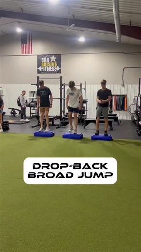 💥 DROPBACK BROAD JUMPS 💥 This explosive plyometric drill helps athletes develop power, control, and coordination through a reactive movement pattern. The dropback adds a change of direction element — forcing you to absorb force, stay balanced, and then drive forward with power. ⚡️ Perfect for building speed, lower-body strength, and overall athletic performance. 🏆 💪 Want access to our online athlete programs? Visit www.barraisingfitness.com #RiseToTheTop #BarRaisingAthlete | Bar Raising Fitn