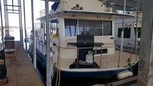 1979 43ft. Carl Craft Houseboat $27,000.00 “The Princess” just needs her prince charming to take her to the ball. Come check out this 43ft. 1979 Carl Craft Houseboat. It just needs a little TLC. It will make a perfect getaway for a couple or even a family. It has a fiberglass hull, two 270HP Chevrolet engines, a lower cabin with two full size beds, a bedroom with a double bed, a full size refrigerator, microwave, stove with oven, generator, BBQ grill, and much more. Located on beautiful Greer's 