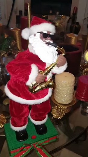 Black Santa Claus playing saxophone