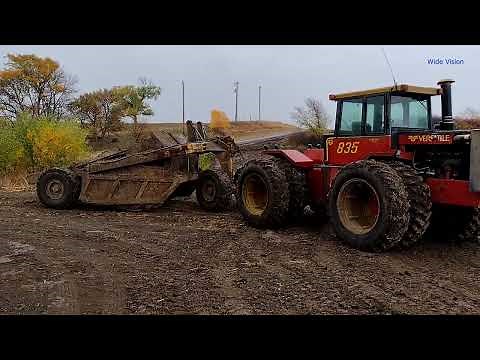 Using Heil Scraper to dig pond!! - Construction Equipment
