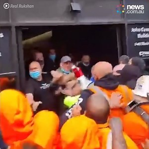 40K views · 648 reactions | A chaotic brawl has erupted outside CFMEU headquarters after hundreds of people showed up to protest mandatory vaccinations for construction workers. Full story: https://newscomau.org/ChaoticBrawl | News.com.au | Facebook