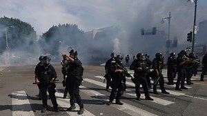 Police allege LA protesters threw concrete, fireworks at officers