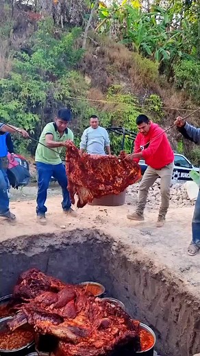 Whole Pig Cooking Over Open Fire: A Culinary Experience