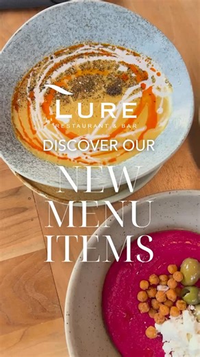 New menu items just landed 👀 Charred Corn & Coconut Soup (vegan) Beetroot Hummus Chicken Shawarma Sandwich Grilled Bison Sandwich Available for lunch and dinner every day of the week! | Lure Restaurant & Bar