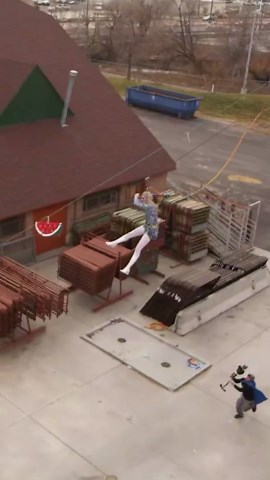 Smashing a piñata while flying on a zipline