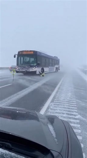 On January 26, 2026, during a heavy snowstorm on a highway in northern Colorado, a road worker attempted to stop a bus that was approaching at very high speed on an icy stretch of road. Witnesses said the bus was unable to slow down due to the slick conditions, forcing the worker to instinctively roll himself off the roadway. Dashcam footage showed the bus passing within roughly an inch of the worker as it slid by, narrowly avoiding a tragic outcome. Emergency crews later secured the area, and a