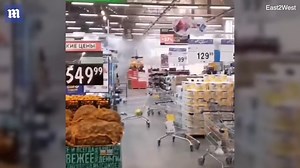 Incredible scenes as barrage of fireworks go off in Russian supermarket