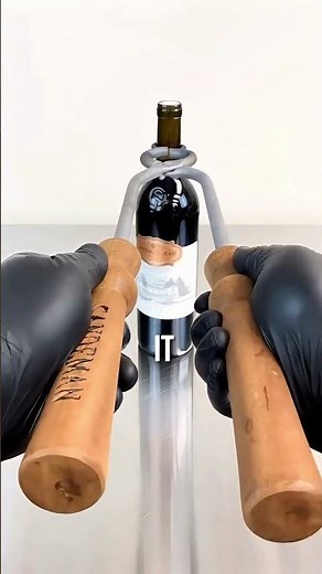 Why They Break Wine Bottles Like This