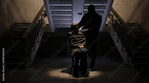 Kidnapped tied woman sitting on the chair. The criminal threatens the victim.