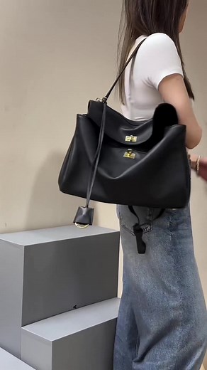 Stylish Calfskin Rodeo Bag with Aged Gold Hardware