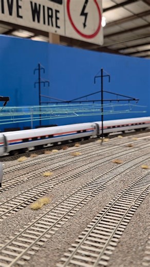 3 Amtrak trains under wires on the @Northeast Corridor layout at the big Timonium train show. | Reading and Lehigh Railroad, N scale