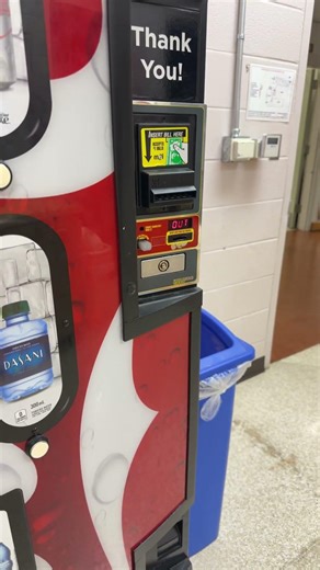 Pushing the buttons on the vending machine at Sertoma Arts Center in Raleigh NC (2026)