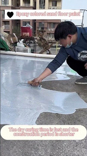 Epoxy colored sand floor paint with a faux marble effect