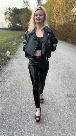 I'm walking outside the city in shiny, squeaky leggings.