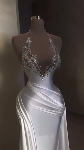 To order this white dress DM reineecouture A sleek white halter gown defined by a sculpted