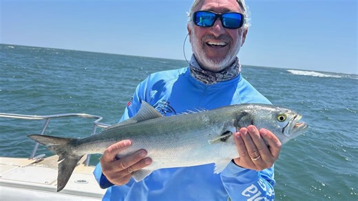 Fishermen enjoy morning bite with bluefish outside inlets, over Monmouth's rocks