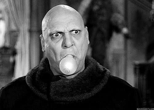Uncle Fester really knows how to light up a room :) #JackieCoogan #TheAddamsFamily | Classic Movie Hub