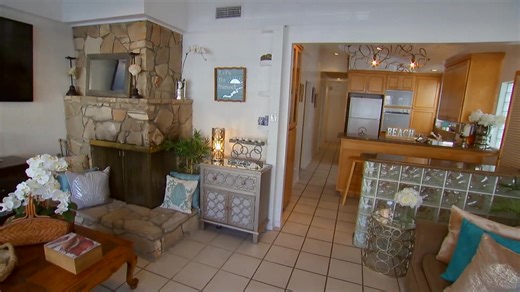 A couple's dream of buying a $1 million vacation home in Newport Beach, California, is put to the test when they disagree over its style. He's pushing for a cozy cottage with a lived-in feel. She insists on a stark white contemporary home. | House Hunters