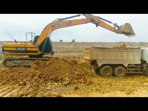 JCB JS210 Excavator Loading Massive Caterpillar 777 Dump Trucks | Extreme Mining Power!