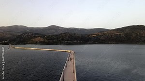 Famous Bosset bridge connection Argostoli city bay in Greece, aerial forward
