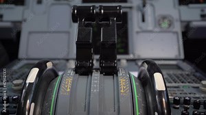 Close up cockpit flight deck control panel. Thrust levers of a modern jet aircraft, airplane system technician, flight operation, flight radio control, air traffic control, cockpit flight equipment