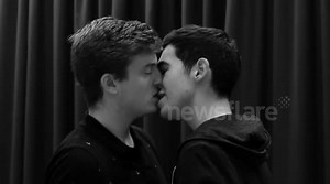 Strangers kiss on camera for university project