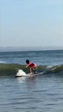 Surfing at Pantai Kuta
