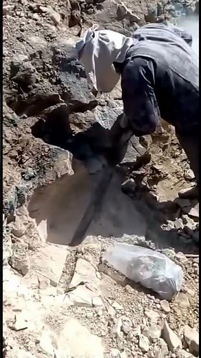 Channel sampling of rocks within an exploratory trench