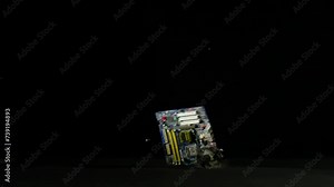 Male hands destroying and damaging computer motherboard, smashing it hard on the floor, slow motion shot. Technology and people concepts.