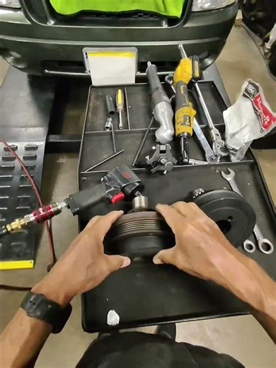 This is a bad harmonic balancer. The pulley has broken loose.