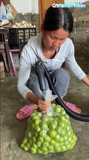Farmers vacuum pack fresh plums freshly picked from the fruit trees