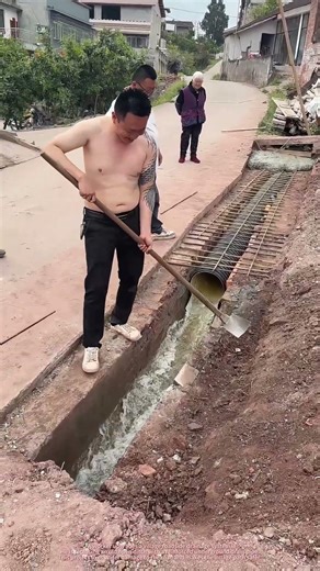 Installing an Underground Drain Pipe | Rural Infrastructure Upgrade for Village Road Protection