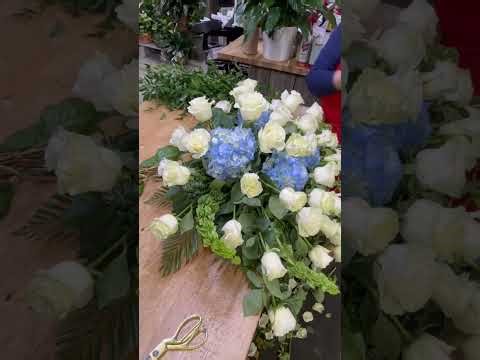 Creating the Canvas of Heaven Casket Spray | White Roses & Blue Hydrangea Funeral Flowers