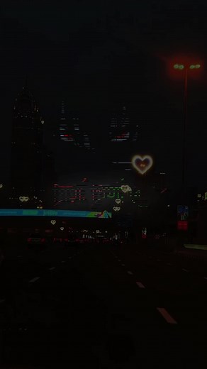 Nighttime Cityscape with Animated Graphics Showcase