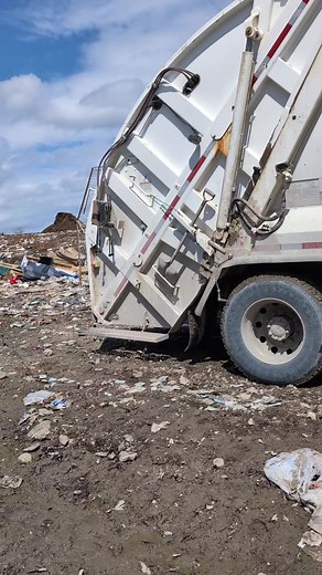Landfill Waste Management: Dump Truck in Action