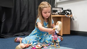Playing with dolls could help a child's social development - including those with neurodiverse conditions such as autism