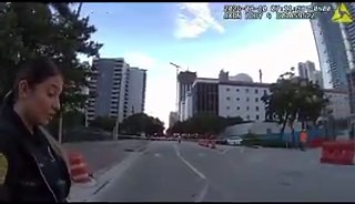 Police body cam footage captures the aftermath of a tragic crash in downtown Miami, allegedly caused by social media model Maecee Marie Lathers, who was reportedly under the influence of "pink cocaine." She tried leaving the scene but was stopped by bystanders. The crash, which occurred on August 10th, resulted in the deaths of two individuals. Lathers now faces multiple charges, including DUI manslaughter, vehicular homicide, reckless driving, driving with a suspended license, and causing injur