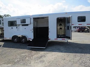 The Exiss (2+1) GN w/ tack room is one of the most versatile trailers on the market today! Complete with a full dressing room, rear ramp, and so much more! This is a very versatile trailer and is great for warmblood horses. -> https://bit.ly/2KPxC2k | Crossroads Trailer Sales | Facebook