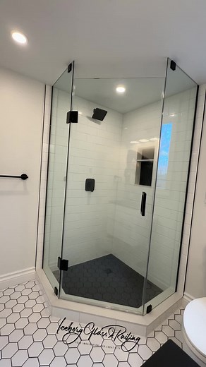 Neo-angle shower with matte black hardware. #toronto #shower #bathroom #bathroomdecor #bathroomremodel #bathroomreno #bathroomrenovation #bathroomdesign #interiordesign #torontodesigner #torontorenovation #torontocontractor #shower #glassshowerenclosure #glassshower #framelessglassshower #interiorglass #renovation #torontohomes #torontocondos #florida #tiles #realestate #bathtub #bocaraton #naples #miami #fortlauderdale #customshower #customglassshower #bathroomdesign #homerenovation