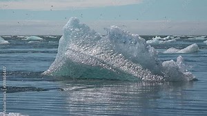 Iceland. Floating icebergs in Jokulsarlon Glacier Lagoon. Jokulsarlon is a glacial lake in southeast Iceland near Vatnajokull National Park. 4K UHD video.