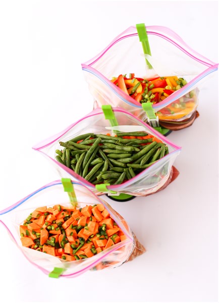 Check out this freezer hack I have been using for years! Every Tuesday at Panera Bread's bagels are half off. Every few weeks, I get two dozen of them and freeze them in a huge freezer bag. Bagels, freeze and reheat really well and make a great breakfast for busy mornings. Follow along for ways to utilize your freezer even more to save time and money! Learn more at https://thrivinghomeblog.com/1-hour-freezer-prep. #freezer #freezermeals #panera #bakersdozen #moneysavingtips #easybreakfast | Thri