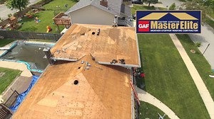 This home in Highland, Indiana enhanced their roof by installing a brand new Timberline shingles from GAF - Roofing and in doing so they received a Golden Pledge warranty (top notch roofing warranty). We installed a brand new power attic vents, chimney stack, and all GAF Roofing roofing products (underlayment, starter strip, ridge caps, & shingles). ﻿ | Total Roofing and Construction