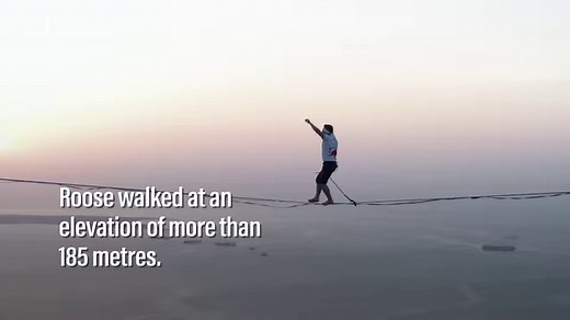 Three-time Slackline World Champion and Red Bull athlete Estonian Jaan Roose set a record in Qatar by walking across the world’s longest LED slackline. | The National