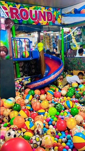 Rolling around under the mini blue and red slides in the ball pool is fun and exciting 😍🤗